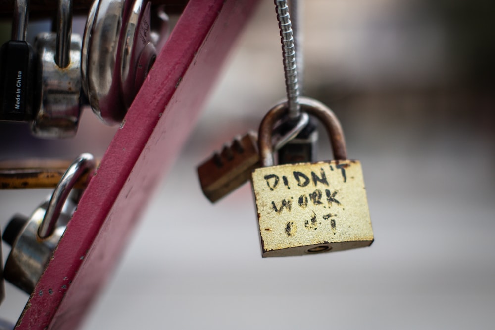 a padlock attached to a red bike with the words didn't work on