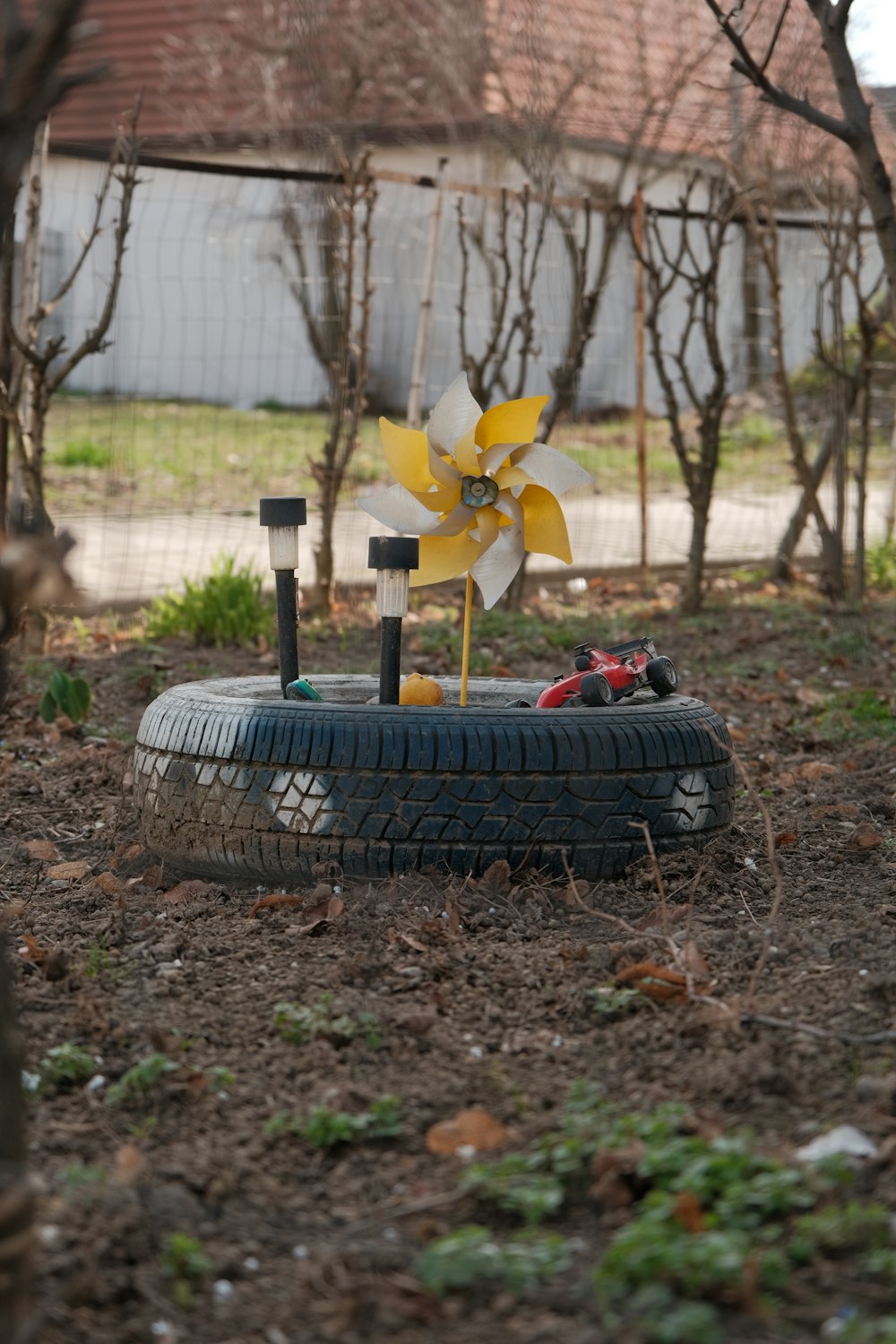 a tire with a wind turbine on top of it