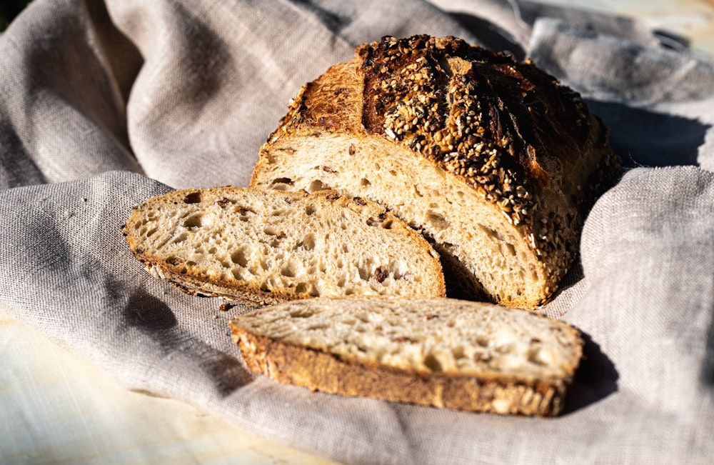 a loaf of bread sitting on top of a cloth