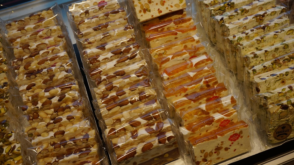 a display case filled with lots of different types of food