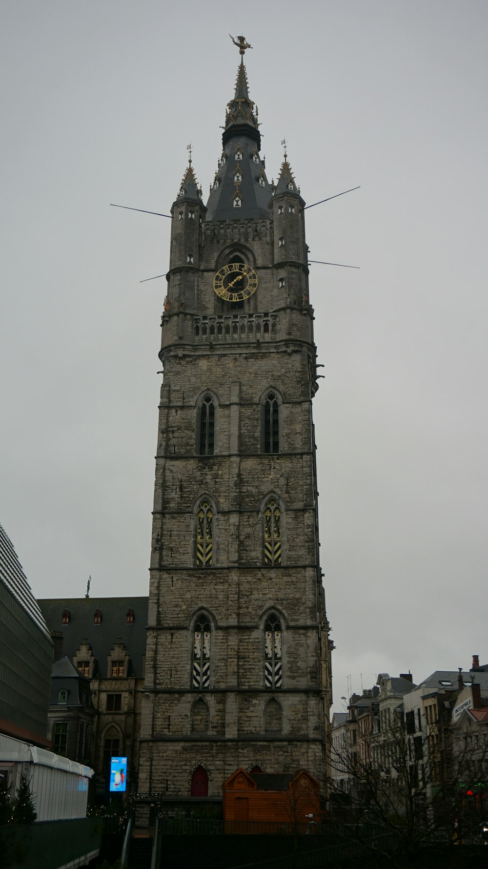 a tall tower with a clock on the top of it