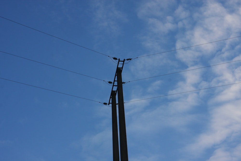 a tall pole with some wires attached to it