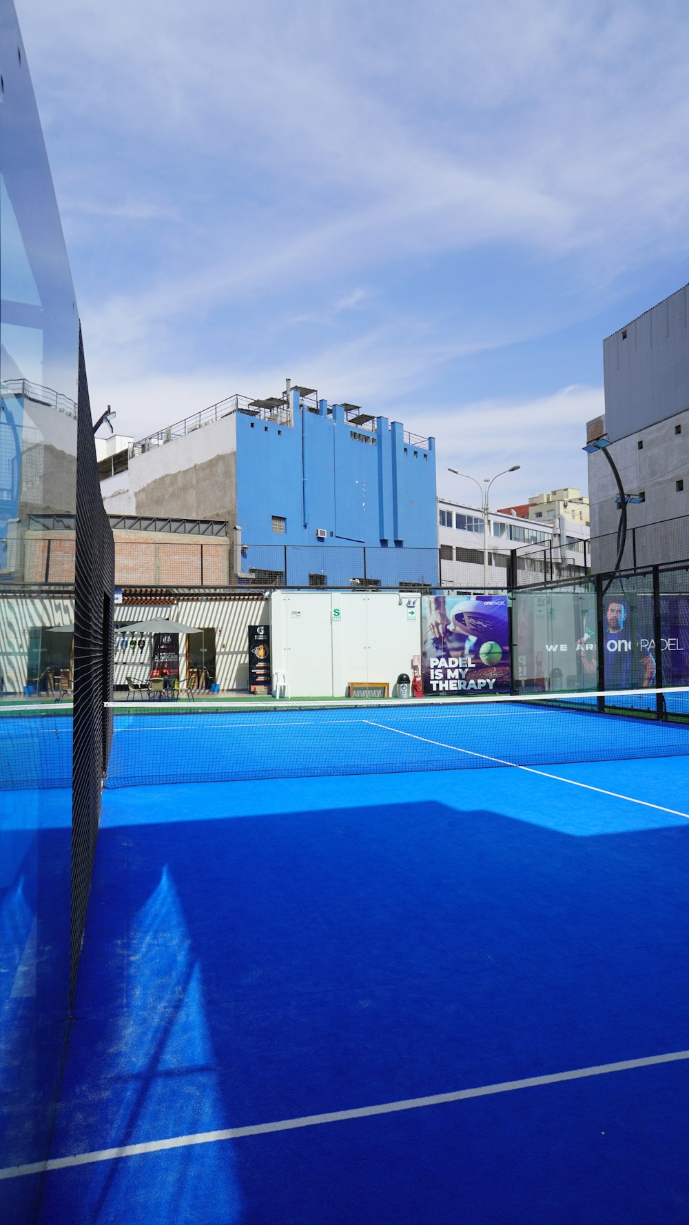 a tennis court with a tennis racket on it