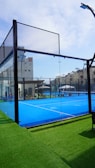 a tennis court with a net on top of it