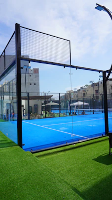 a tennis court with a net on top of it