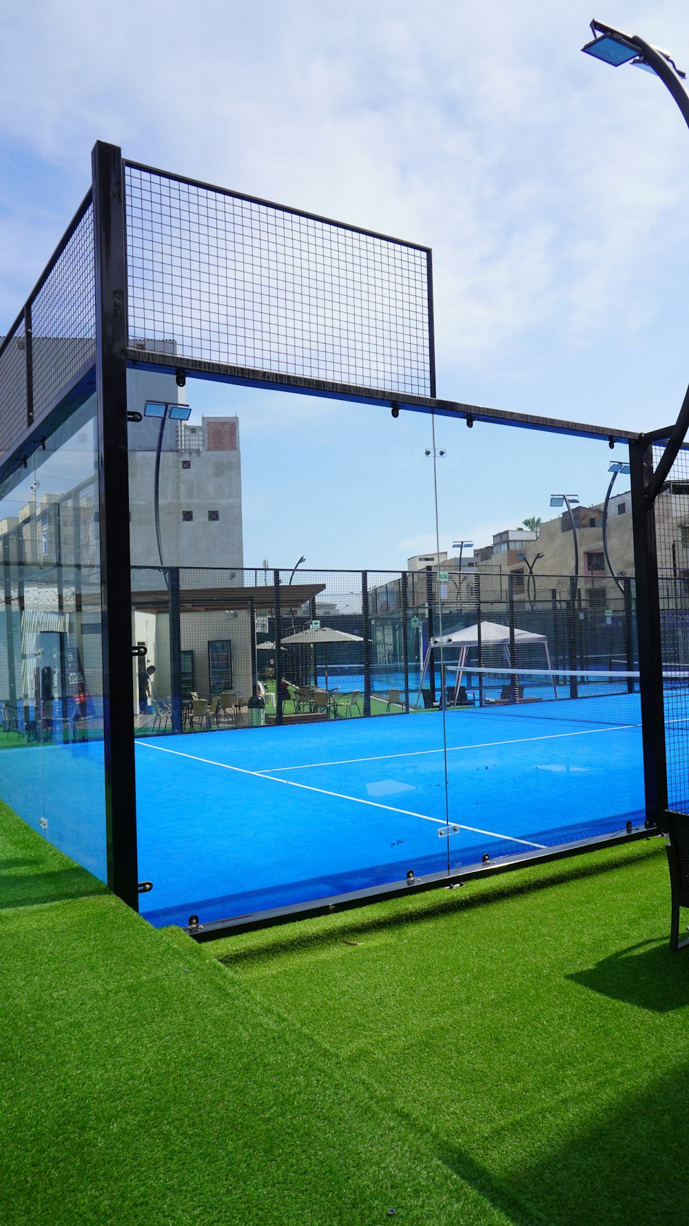 a tennis court with a net on top of it