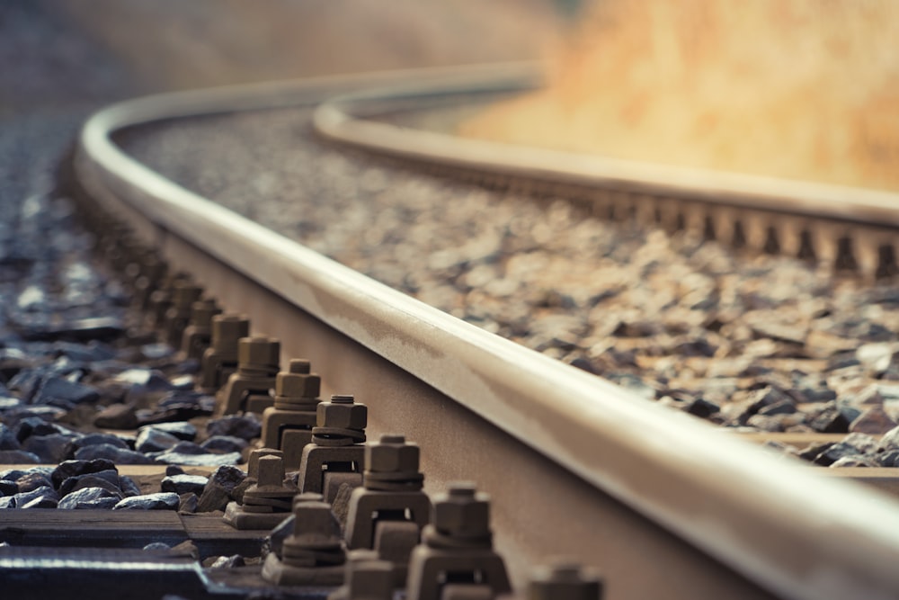 a close up of a train track with a blurry background