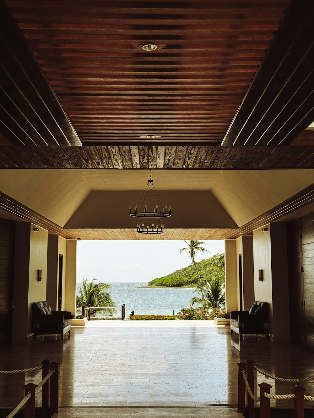 a large open room with a view of the ocean