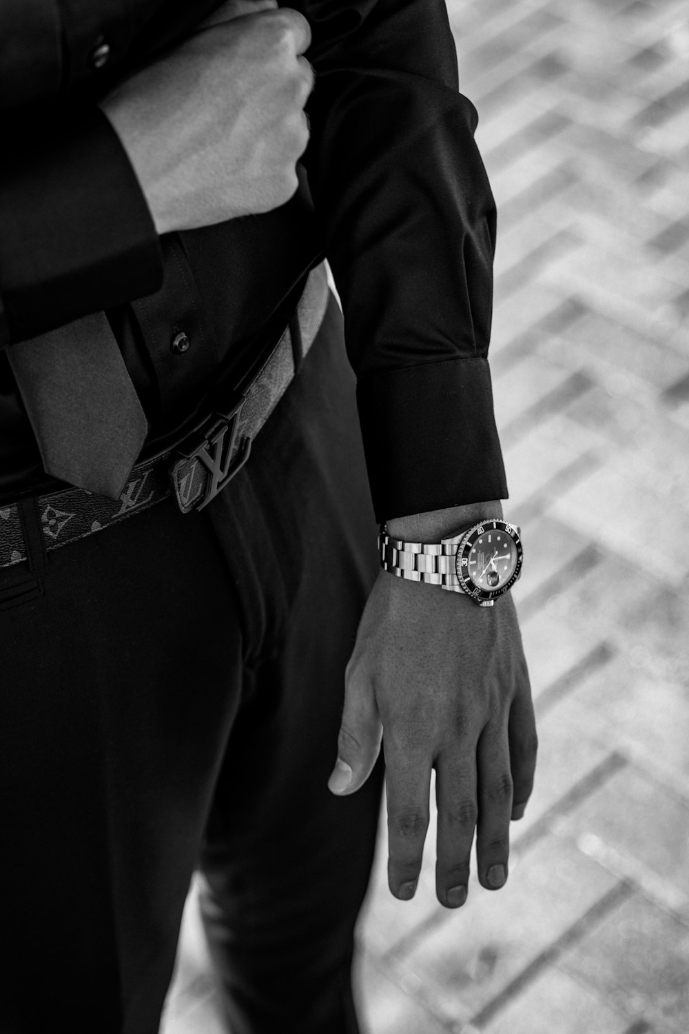 a close up of a person wearing a watch