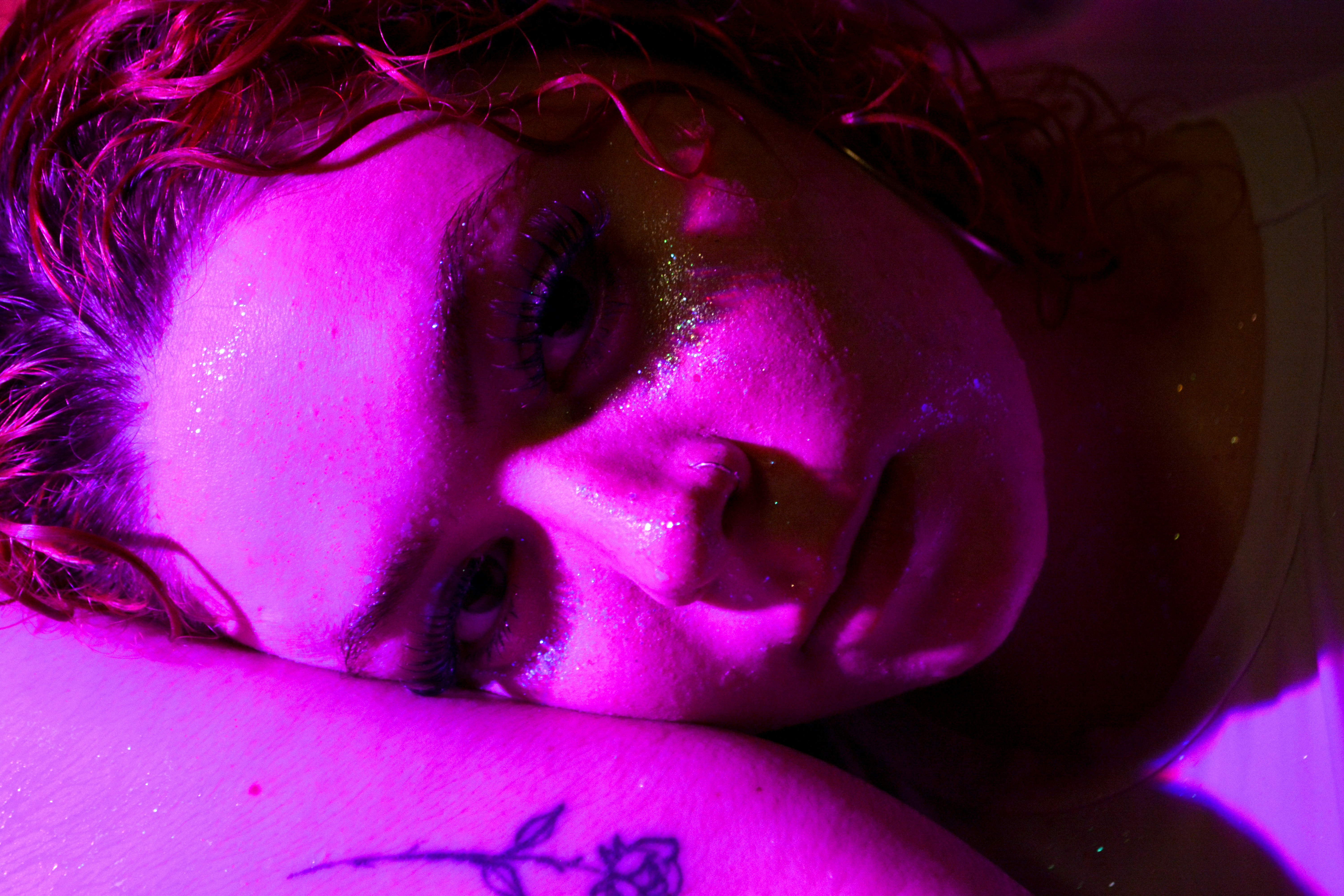 A man with a tattoo on his arm