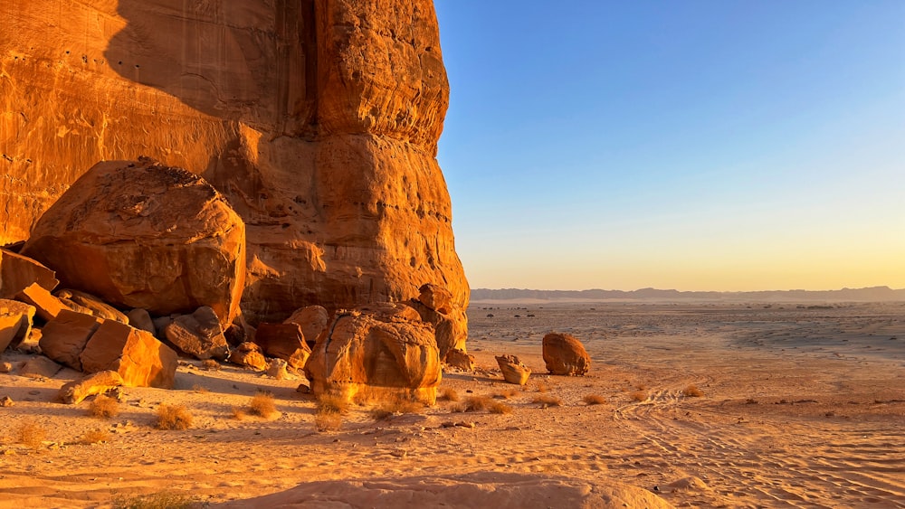 a rocky outcropping in the middle of a desert