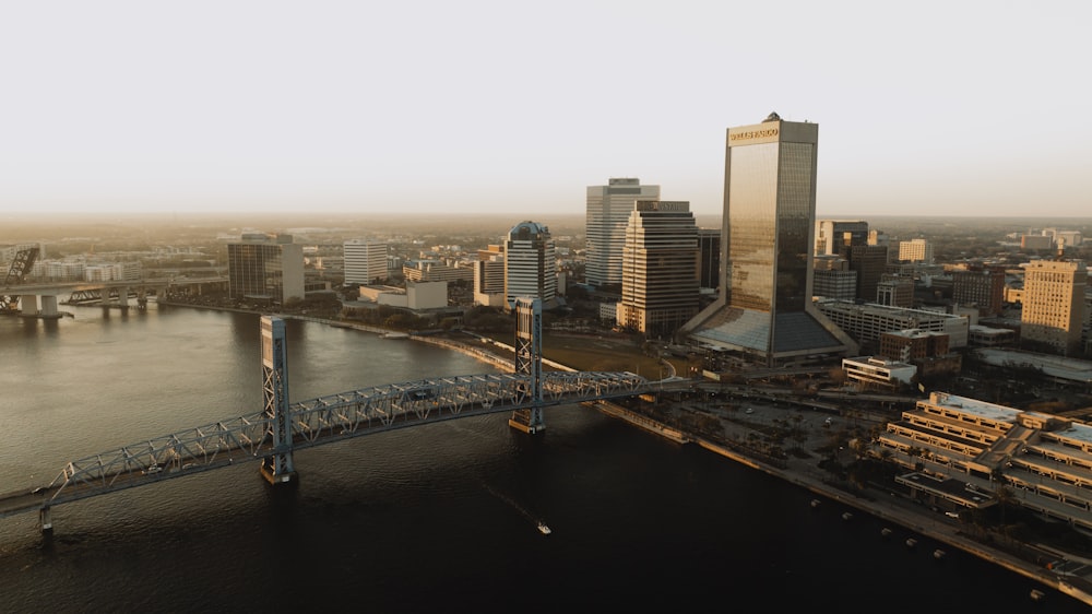 an aerial view of a city and a bridge