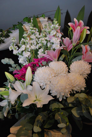 a bunch of flowers that are sitting on a table