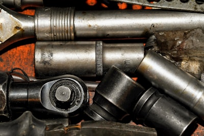 Professional plumber at work with tools - representative of Any Plumbing's skilled team