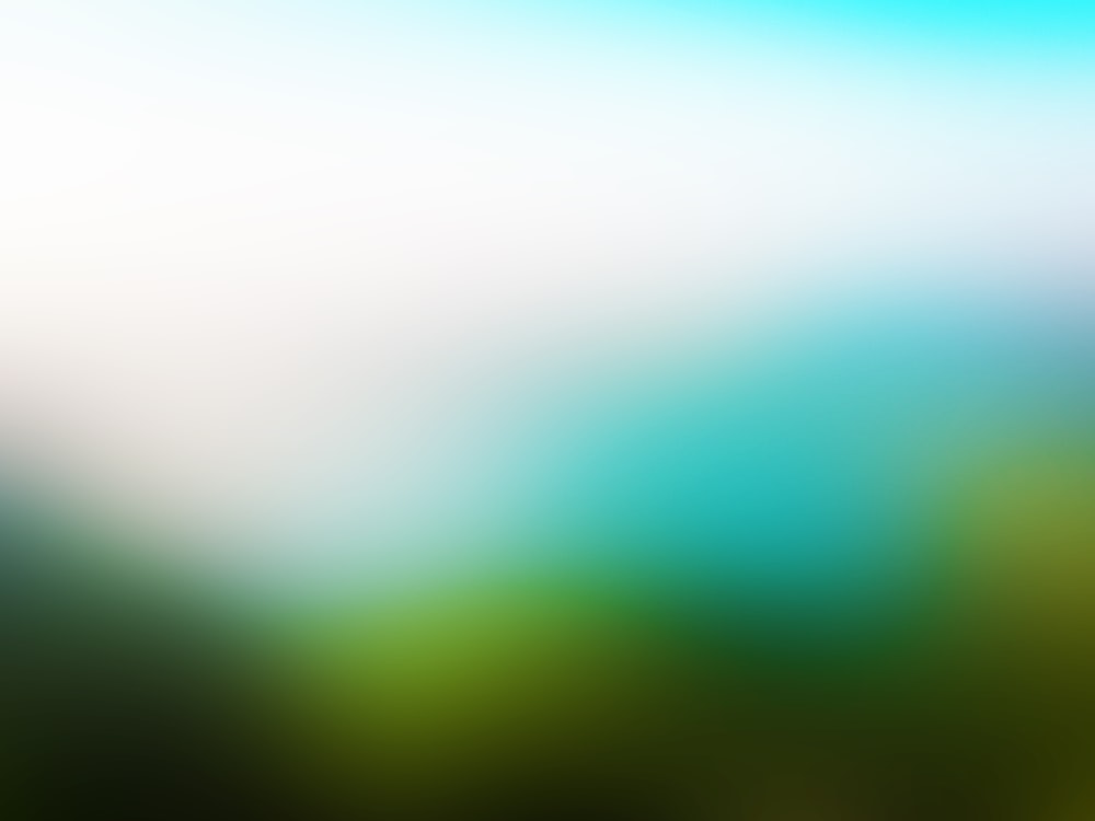 a blurry image of a blue and green background