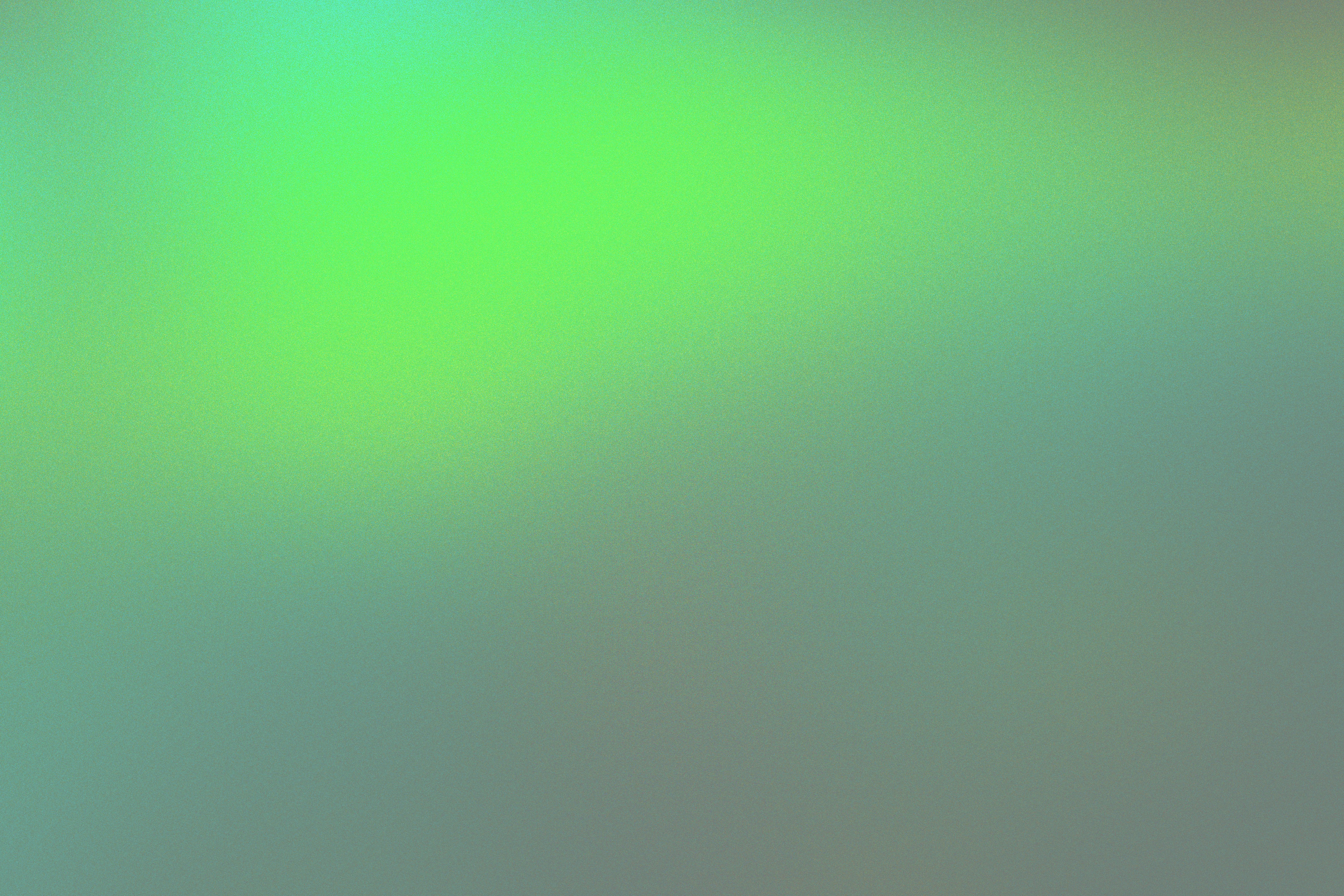 una imagen borrosa de un fondo verde y azul