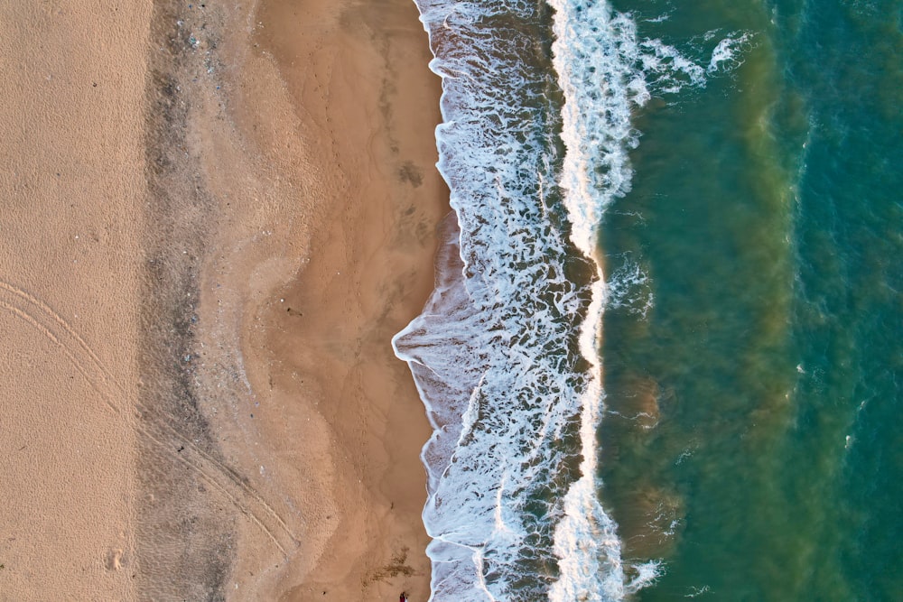 a bird's eye view of a beach and ocean