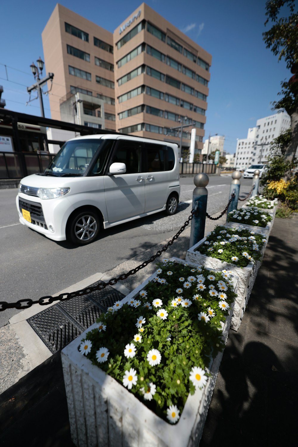 a white van parked on the side of the road