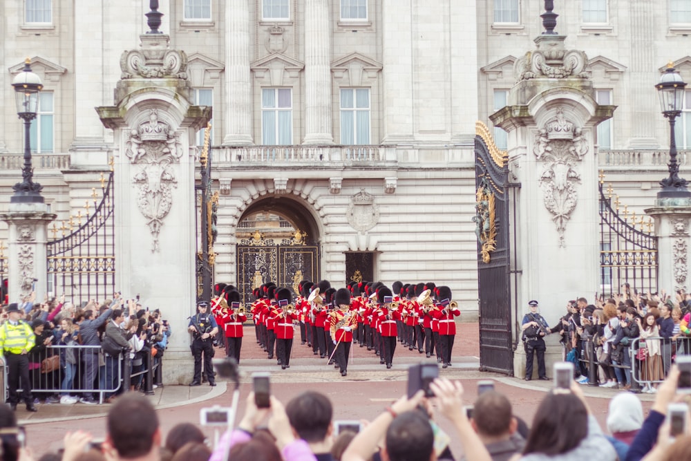 a group of people standing in front of a building