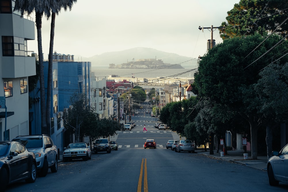 a street with cars parked on both sides of it