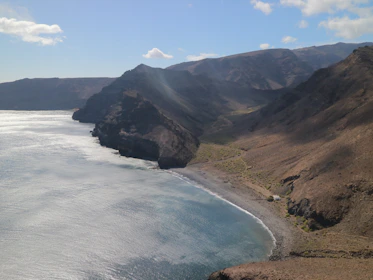 a large body of water surrounded by mountains