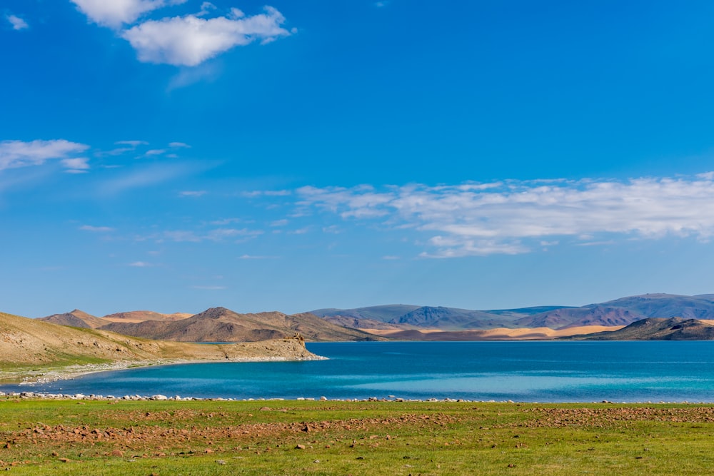 a large body of water surrounded by mountains