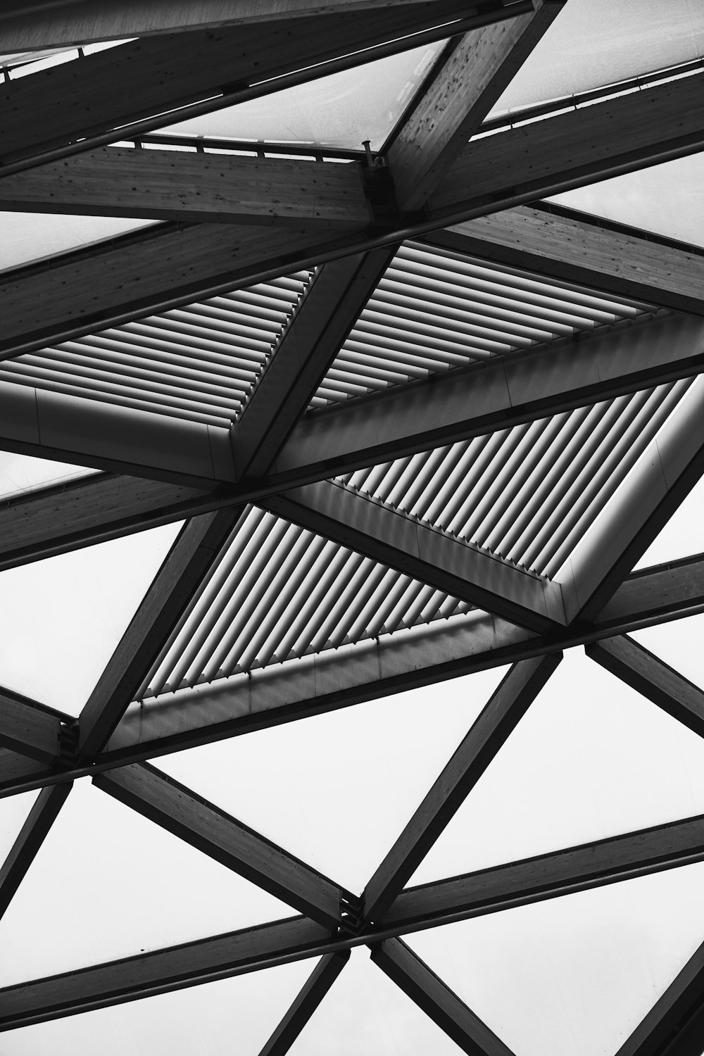 a black and white photo of a metal structure