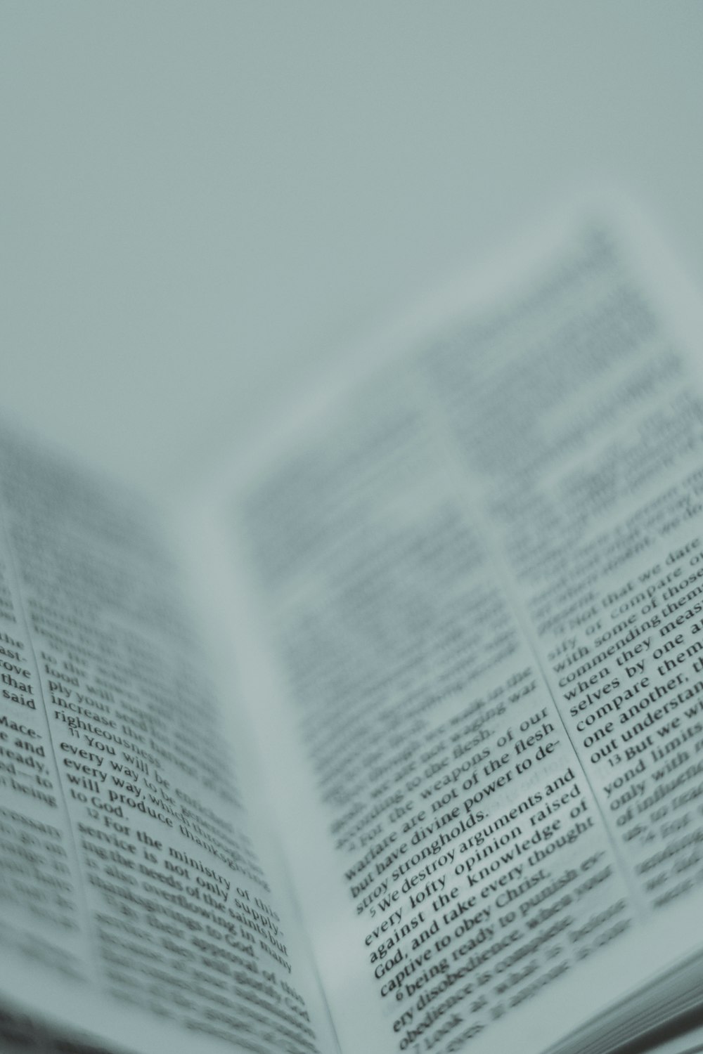 a close up of an open book on a table