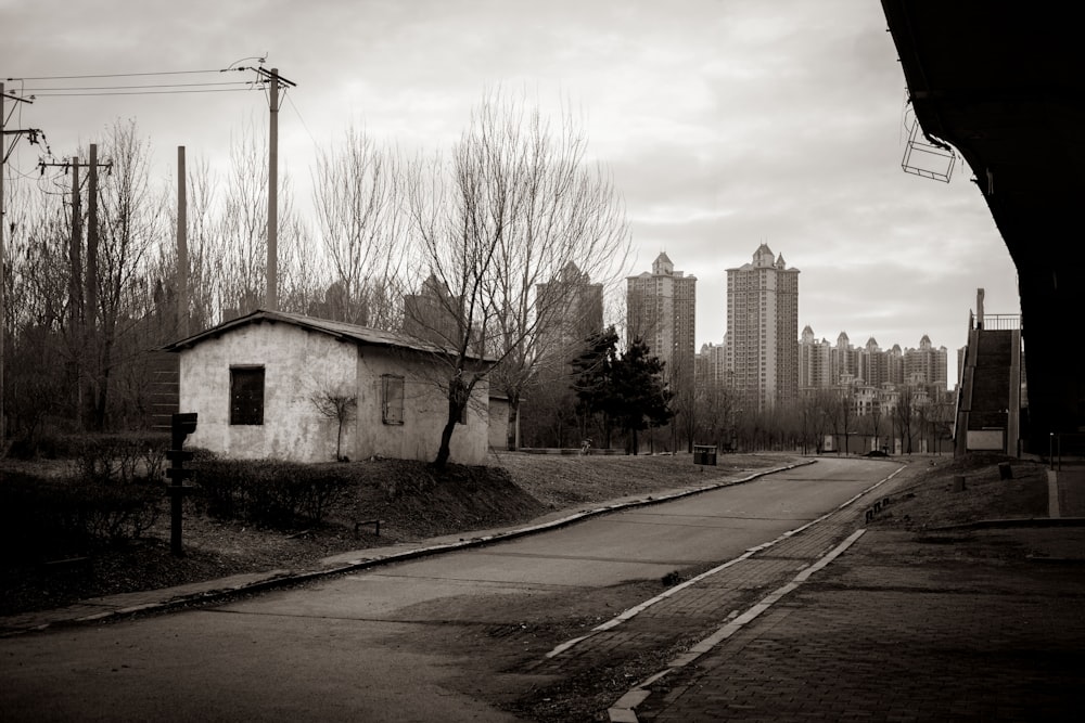 a black and white photo of a small building