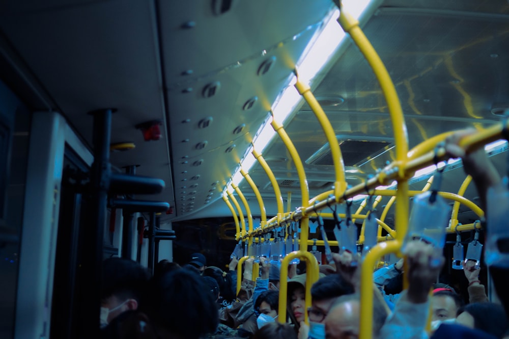 a group of people riding on a bus