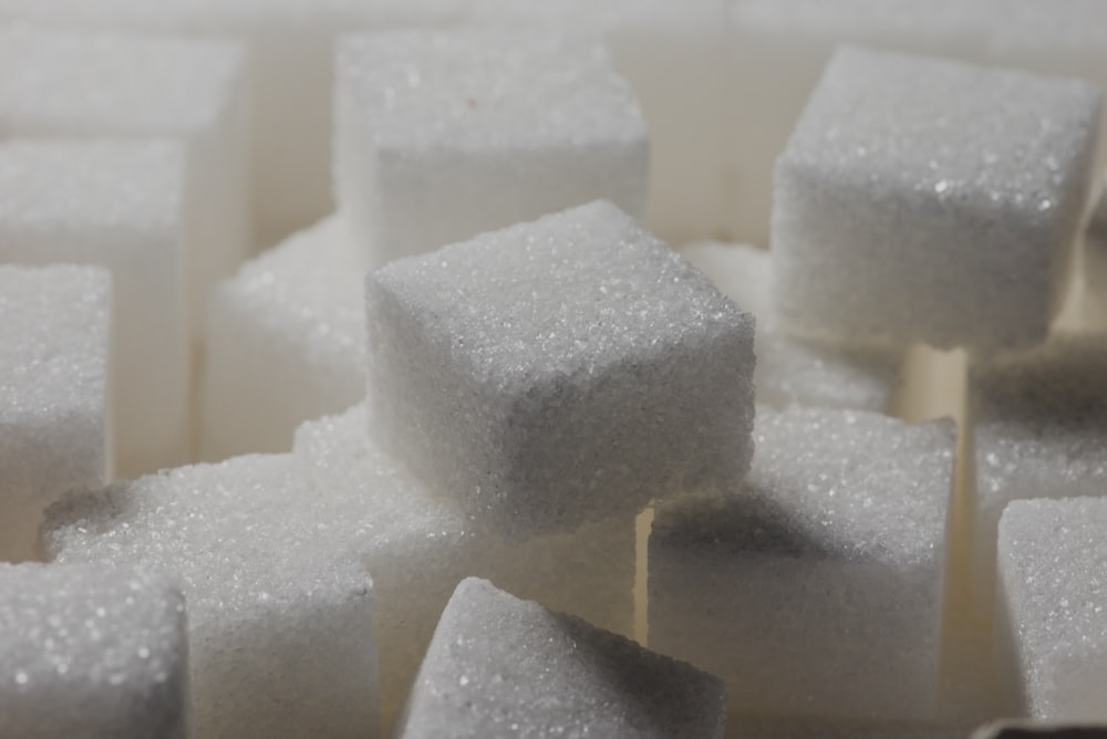 a pile of sugar cubes sitting on top of each other