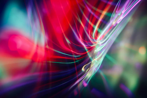 a blurry image of a red, green, and blue background