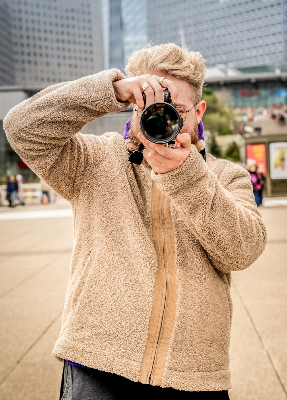 a man taking a picture of himself with a camera