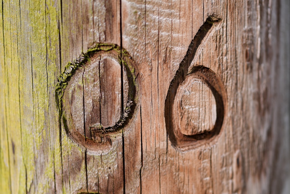 a close up of a wooden door with numbers on it