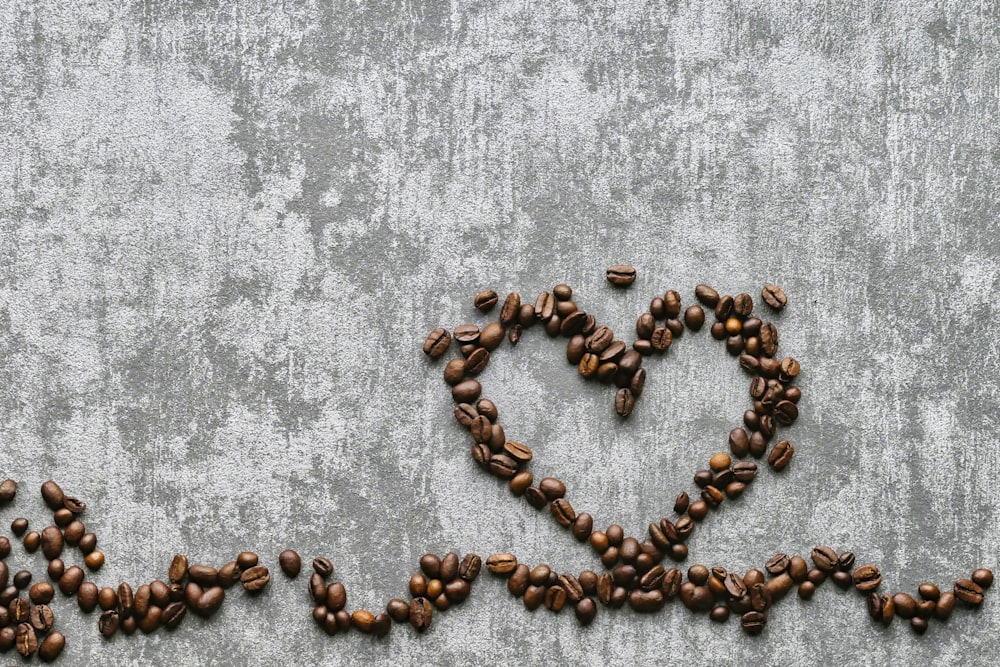 a heart made out of coffee beans