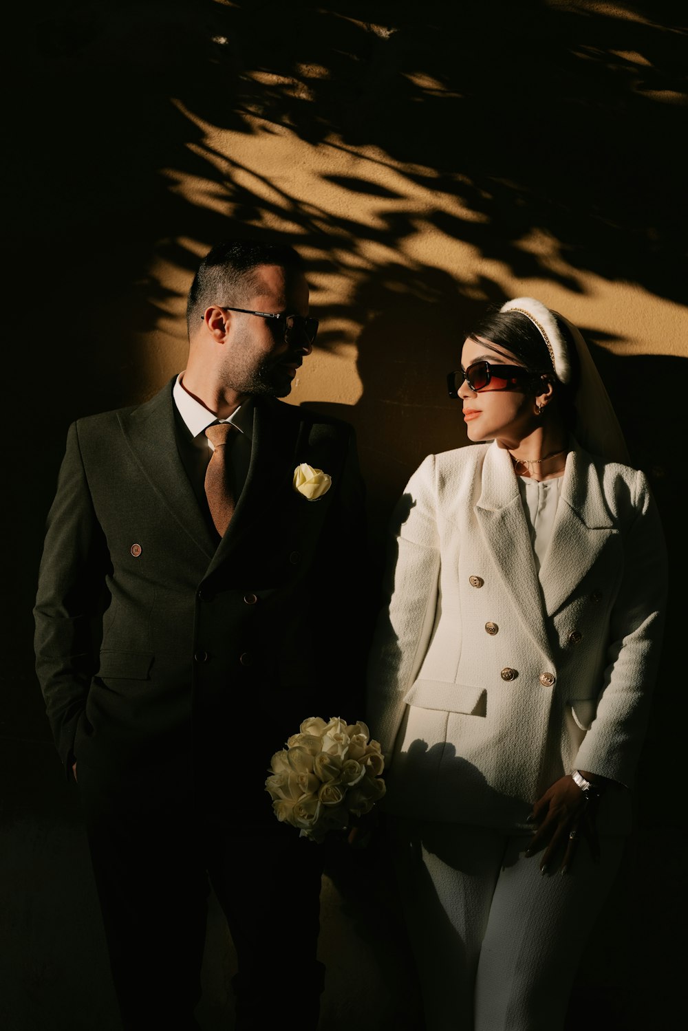 a man and a woman standing next to each other