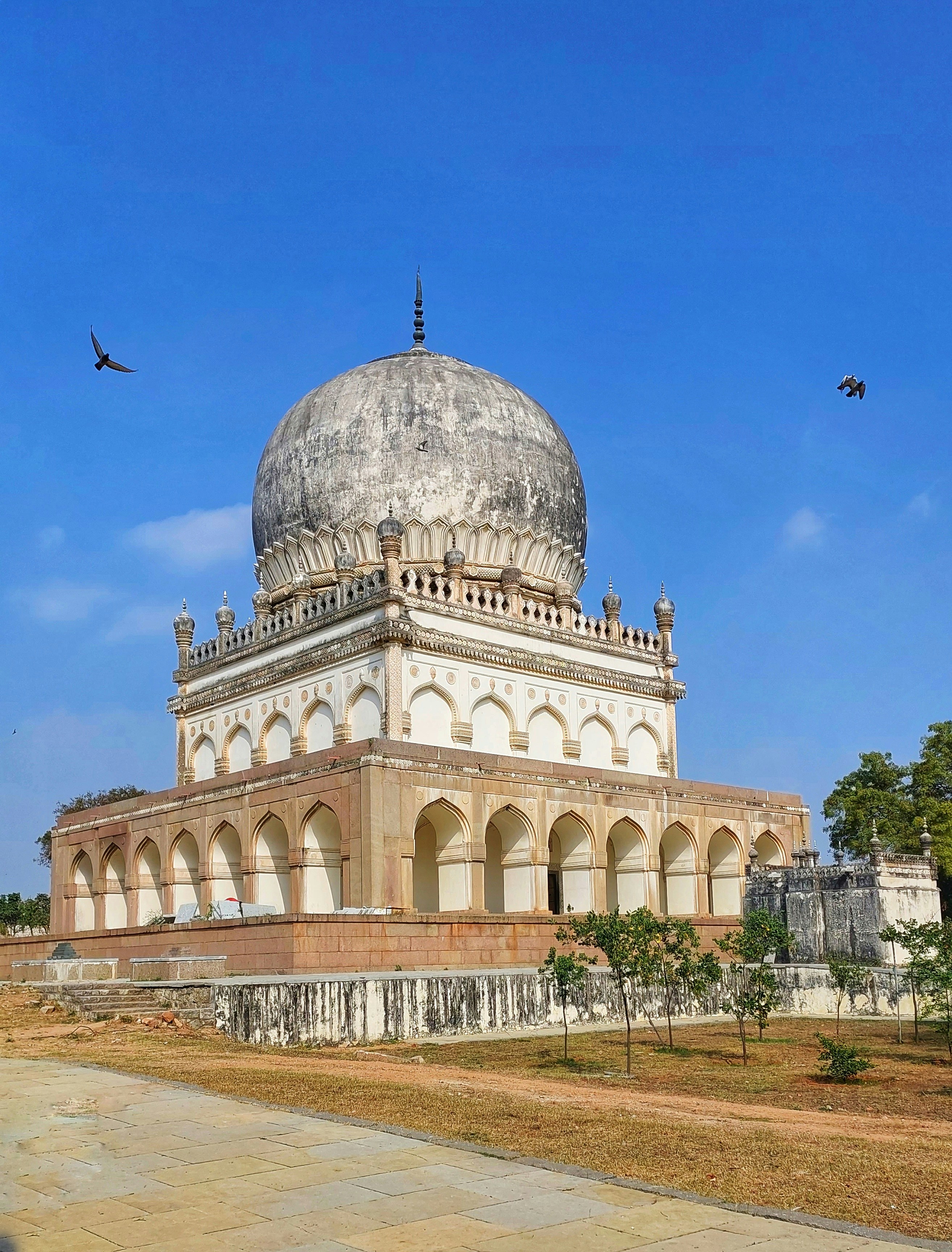 a large white building with a dome on top