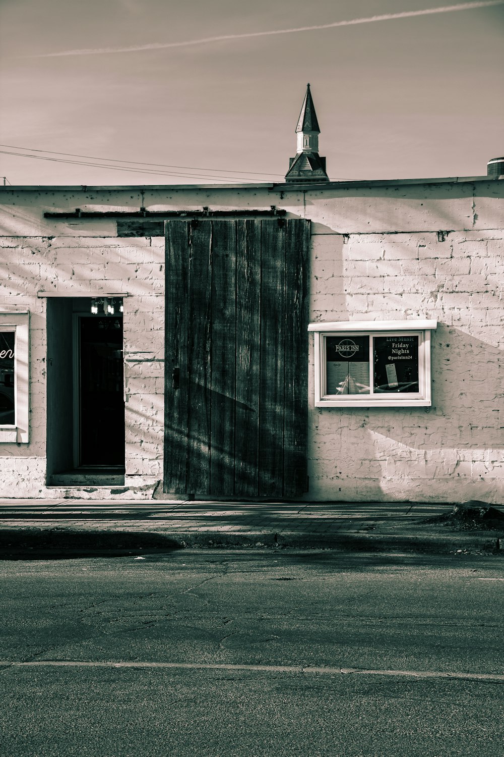 a black and white photo of an old building