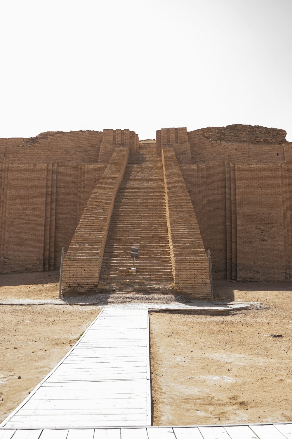 a stone structure with steps leading up to it