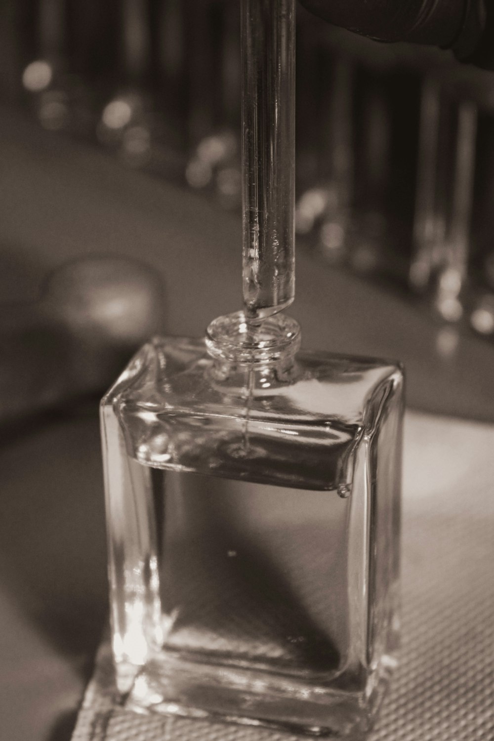 a bottle of perfume sitting on top of a table