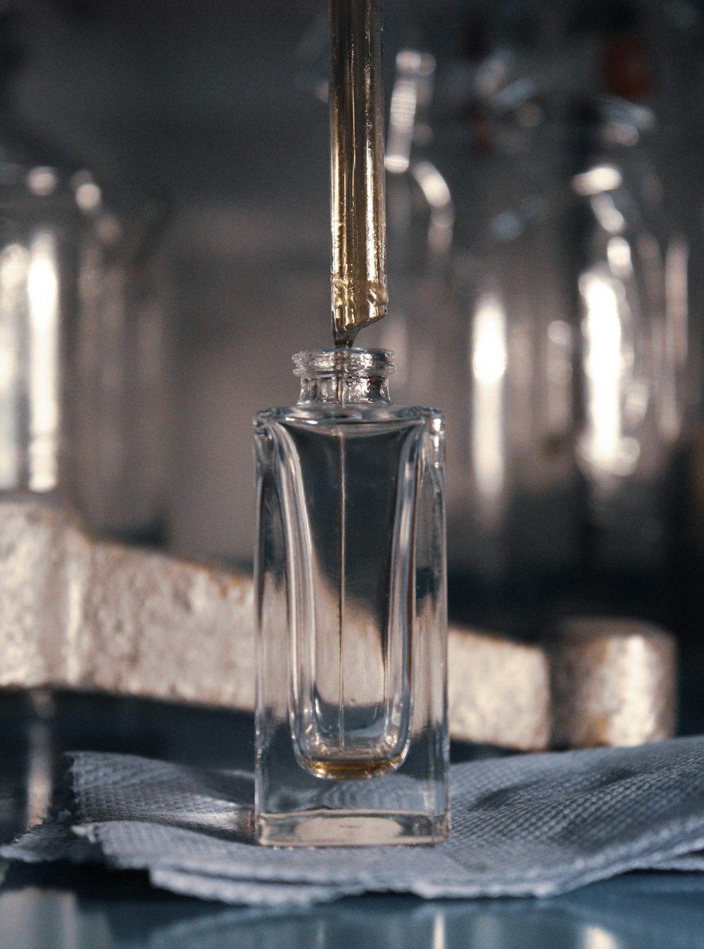 a bottle of perfume sitting on top of a table