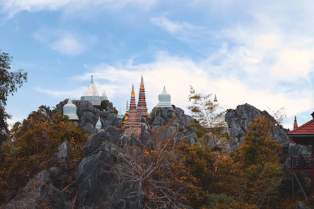 a view of a mountain with a temple on top of it