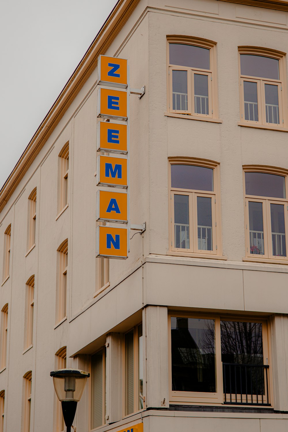 a tall building with a sign on the front of it