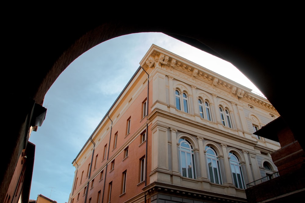 a view of a building through an arch