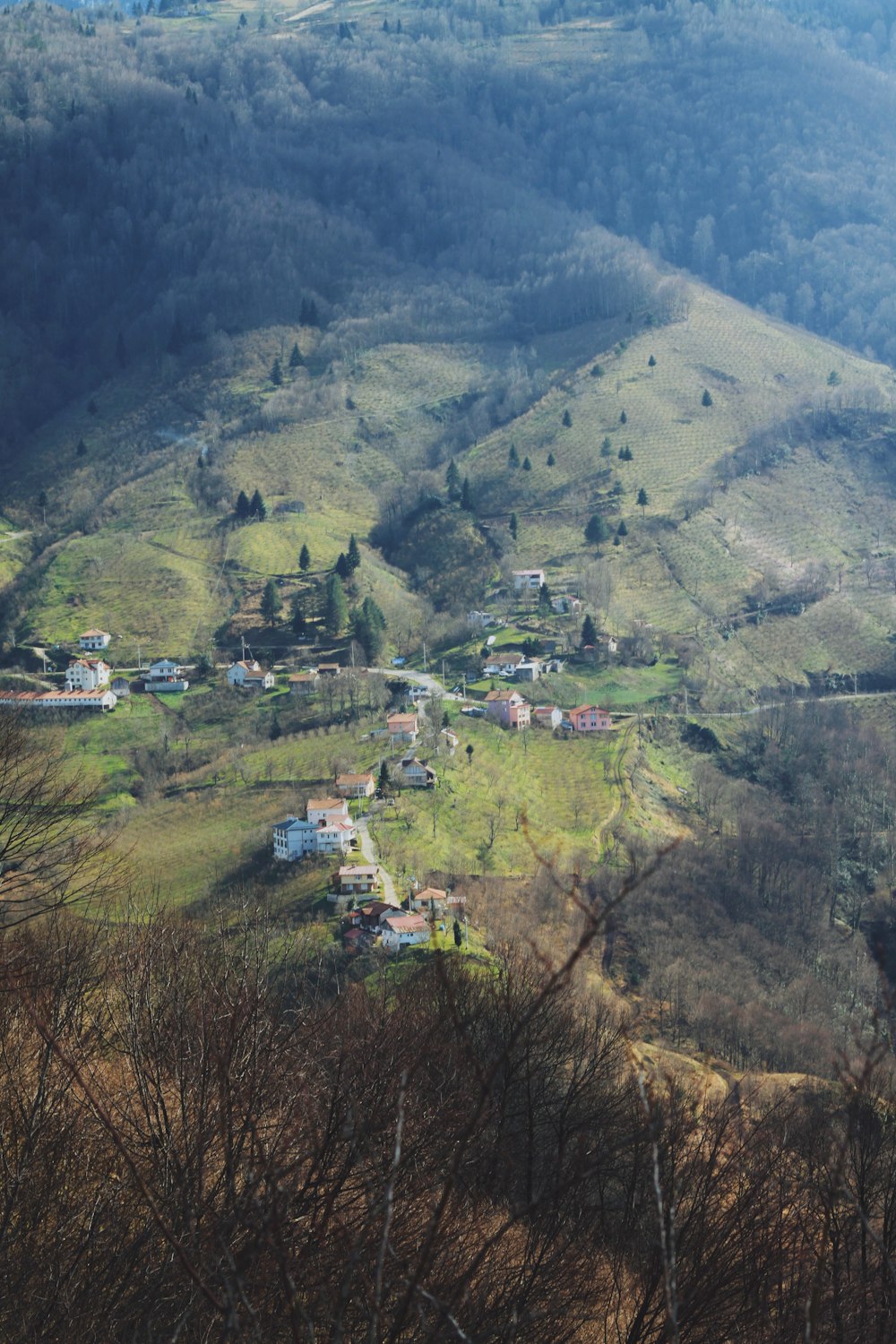 a view of a small village in the mountains