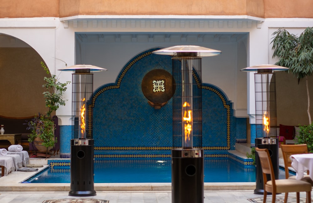 a restaurant with a pool and a fountain