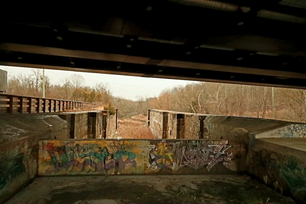 a view of graffiti on the walls of an abandoned building