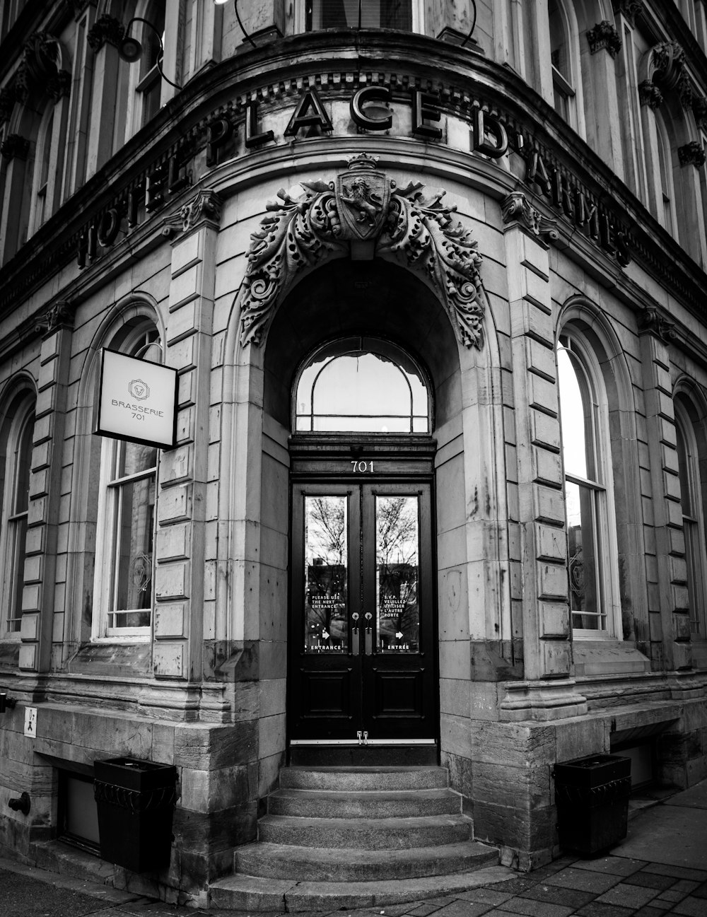 a black and white photo of the entrance to a building