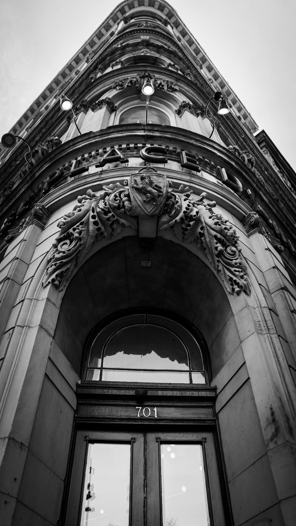 a black and white photo of a tall building