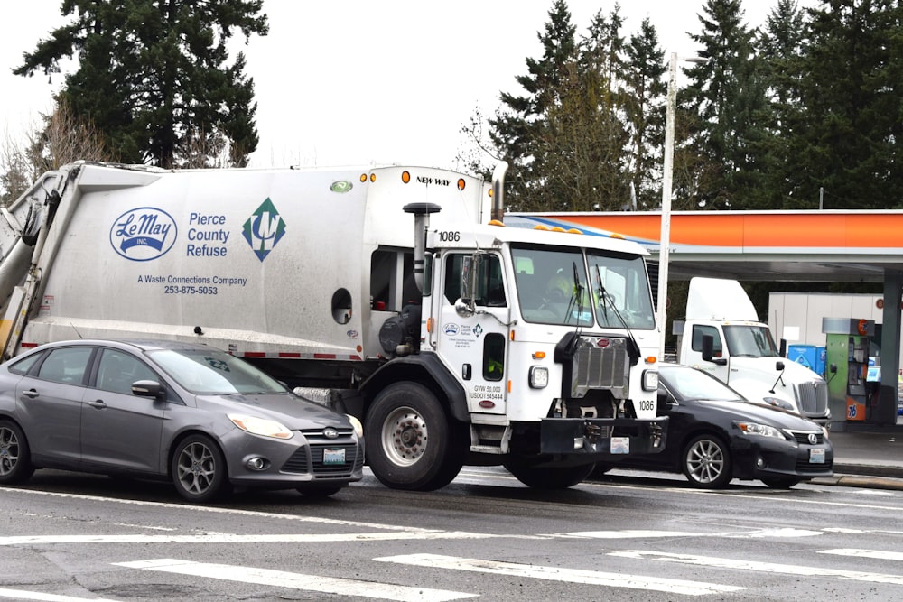 a couple of trucks that are next to each other